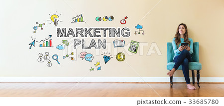 Marketing Plan text with young woman holding a Marketing Plan text with young woman holding a 33685780