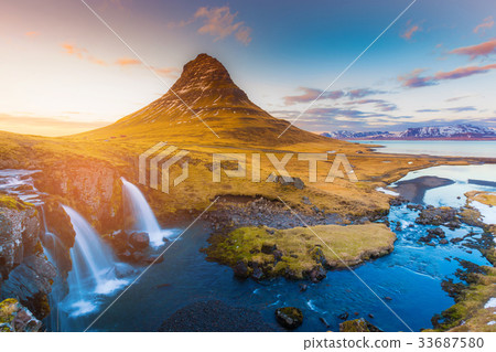 Sunset tone over Kirkjufell volcano Sunset tone over Kirkjufell volcano 33687580