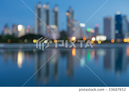 Night twilight blurred bokeh light city downtown Night twilight blurred bokeh light city downtown 33687652