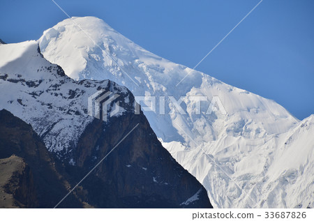 Dylan peak seen from Hunza Callibard in Pakistan 33687826