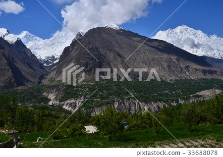 Beautiful mountains and villages seen from Hunza Karimabad, Pakistan Lacaposi peak and Dylan peak 33688078