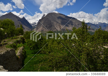 Beautiful mountains and villages seen from Hunza Karimabad, Pakistan Lacaposi peak and Dylan peak 33688089