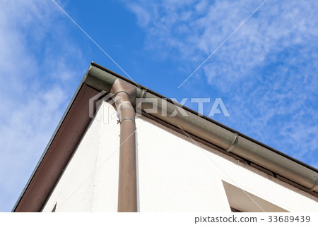 an rain drain from the roof 33689439