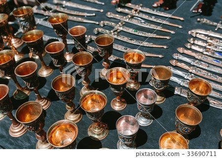 Cups decorated with jewels. Flea market Vernissage 33690711