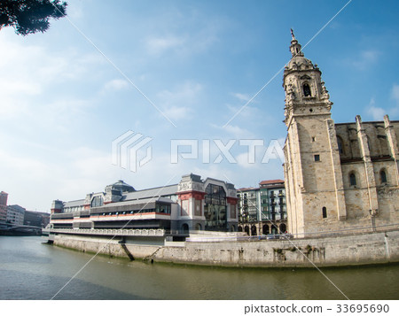 New modern building of church and market by the Nervion river in Bilbao, Spain 33695690