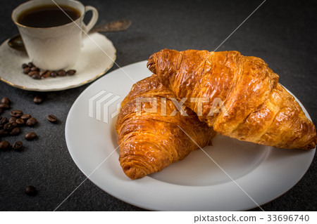 Croissant and coffee 33696740