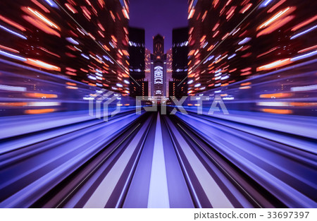 Motion blur train moving in city rail tunnel. 33697397