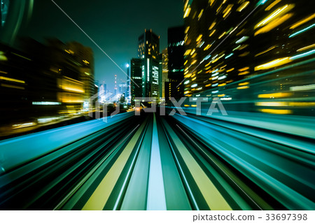 Motion blur train moving in city rail tunnel. 33697398