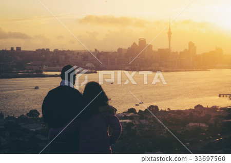 Happy senior couple watching sunset in Auckland 33697560
