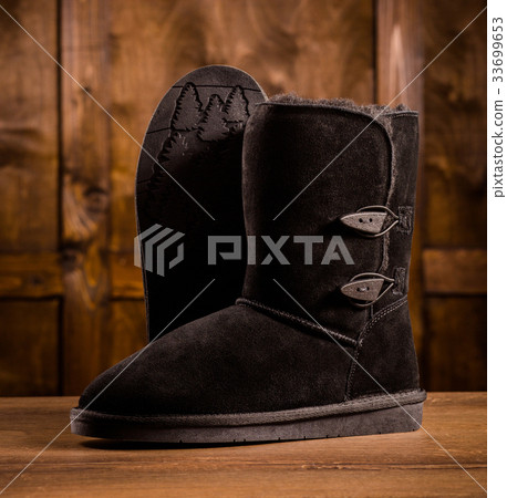Pair of warm suede boots. Pair of warm suede boots. 33699653