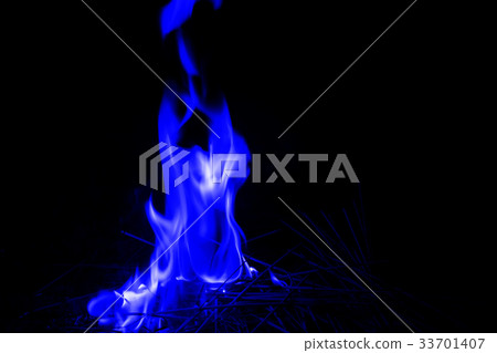 Abstract blue fire flames on dark background. Abstract blue fire flames on dark background. 33701407