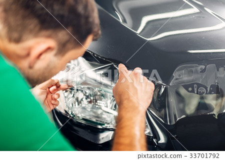 Specialist install car paint protection film 33701792