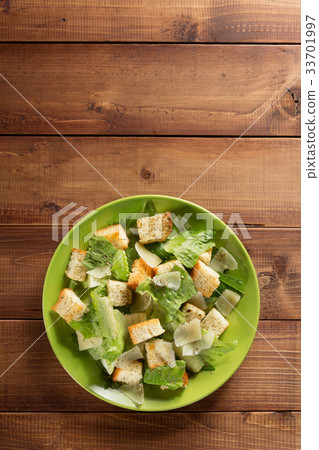 caesar salad in plate at wood caesar salad in plate at wood 33701997