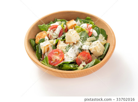 caesar salad in plate on white background 33702016