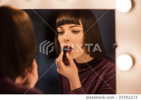 Beautiful fashion woman. Makeup background Beautiful fashion woman. Makeup background 33702215