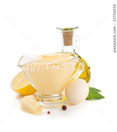 cheese mayonnaise sauce on white background 33702650