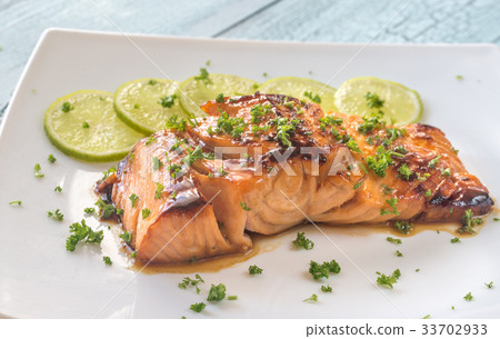 Honey lime salmon on the plate 33702933
