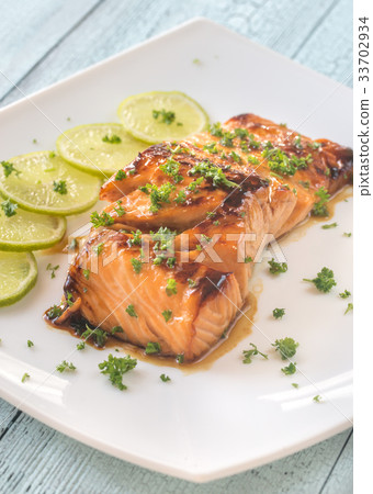 Honey lime salmon on the plate 33702934