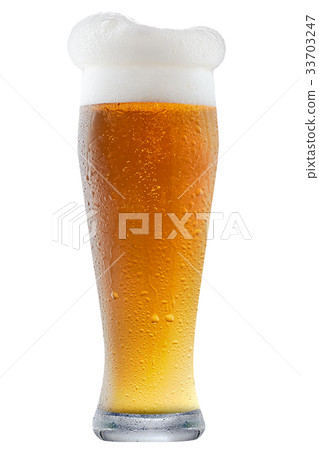 Mug of frosty beer with foam 33703247