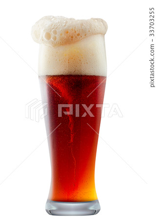 Mug of frosty dark red beer with foam 33703255