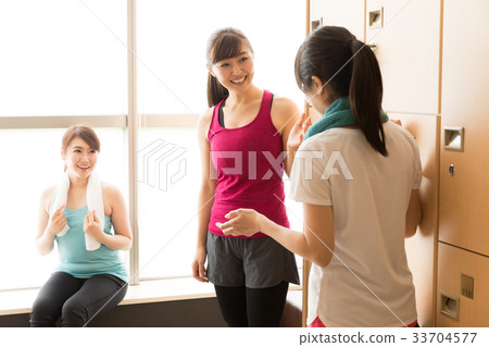 Woman relaxing in the changing room Woman relaxing in the changing room 33704577