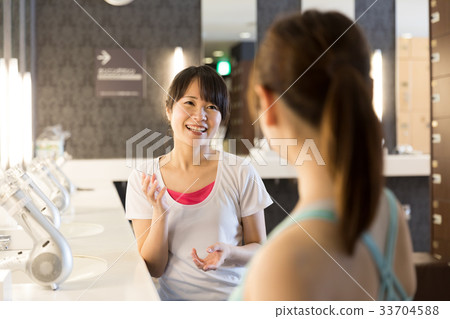 Woman relaxing in the changing room 33704588