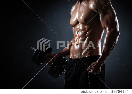 Athletic male with dumbbells 33704905