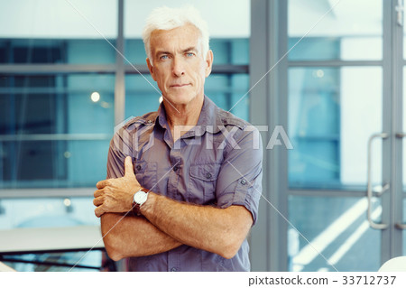 Handsome businessman in office 33712737