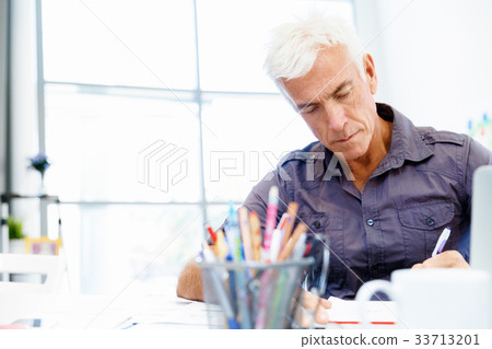 Handsome businessman in office 33713201