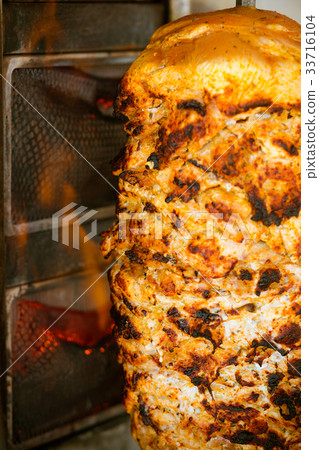 Chicken meal roasted on the fire 33716104