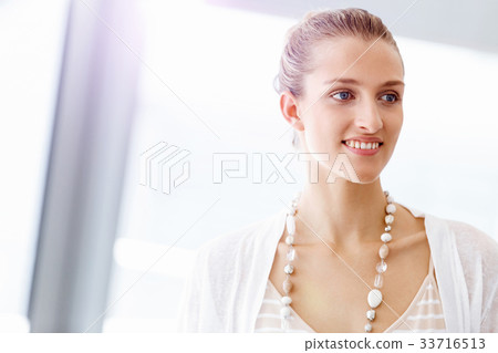 Attractive office worker portrait Attractive office worker portrait 33716513