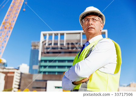 Engineer builder at construction site 33717506