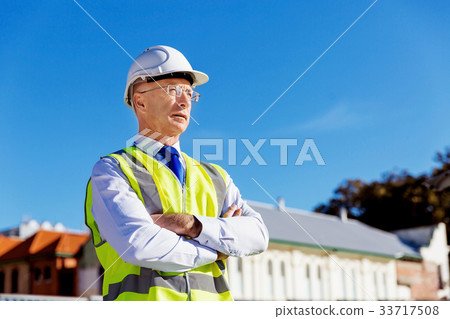 Engineer builder at construction site Engineer builder at construction site 33717508