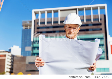 Engineer builder at construction site Engineer builder at construction site 33717659