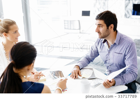 Business people in modern office 33717789
