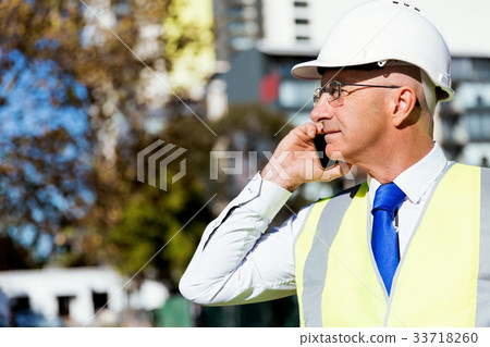 Businessman at construction site Businessman at construction site 33718260
