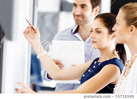 Business people in modern office 33718389