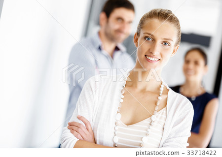 Attractive female worker in office 33718422