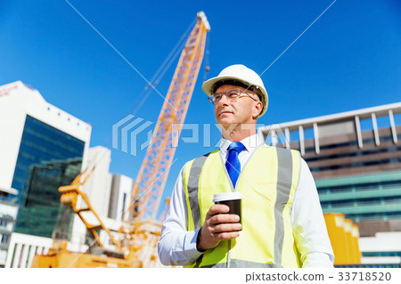 Engineer builder at construction site Engineer builder at construction site 33718520
