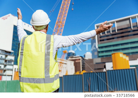 Engineer builder at construction site Engineer builder at construction site 33718566