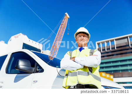 Engineer builder at construction site 33718611