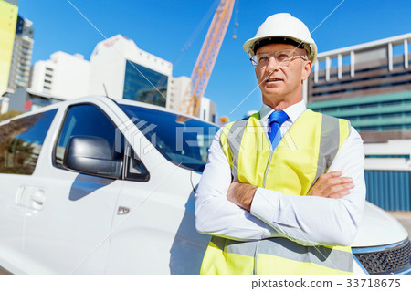 Engineer builder at construction site Engineer builder at construction site 33718675