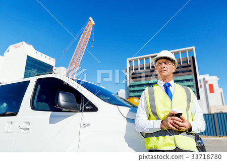 Engineer builder at construction site Engineer builder at construction site 33718780
