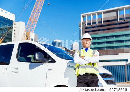 Engineer builder at construction site Engineer builder at construction site 33718826
