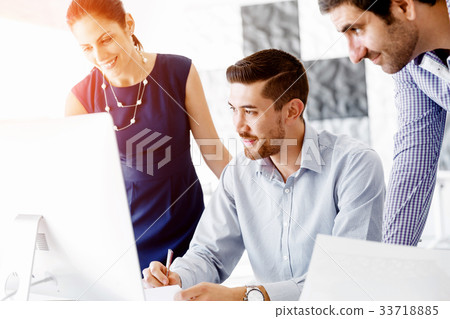 Business people in modern office 33718885