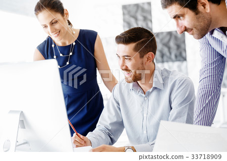 Business people in modern office Business people in modern office 33718909