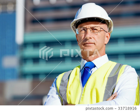 Engineer builder at construction site Engineer builder at construction site 33718916