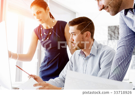 Business people in modern office Business people in modern office 33718926