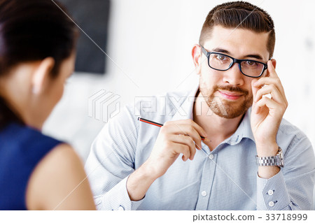 Business people in modern office Business people in modern office 33718999