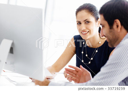 Business people in modern office 33719239